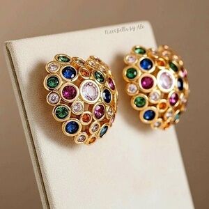 These earrings feature an elegant dome-shaped design